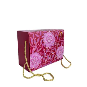 Chinese Traditional New Year Gold Foiled Folk Pink Flower Patterned China Red Paper Box with Glossy Golden Handle for Gift Event