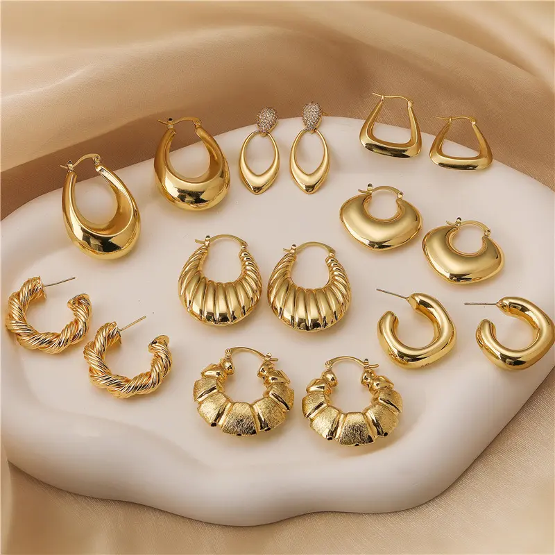 Женские серьги-кольца из массива золота 18 карат