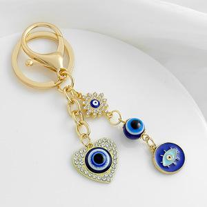 Nouveau porte-clés créatif en strass avec symbole porte-bonheur, œil protecteur, plaqué or, breloque cœur œil bleu pour la protection et la décoration de sac - Product Image 4