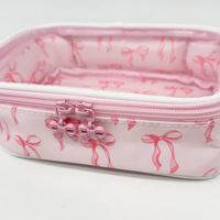Trousse de Maquillage Transparente Grande Capacité en PVC Imprimé Nœud Papillon Coquette – Organisateur de Maquillage et Trousse de Toilette de Voyage