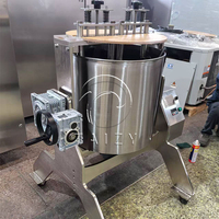 Machine de traitement automatique du chocolat pour le chocolat noir et la pâte de noix