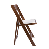 Chaise pliante Hercules pour événements, intérieur/extérieur, aspect bois, résistante aux intempéries, design léger, utilisation polyvalente