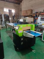 Automatische op- en neergaande horizontale verpakkingsmachine voor snoep, koekjes, zeep, brood, fruit, groenten, multifunctionele verpakkingsmachine