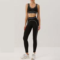Ensemble de sport pour femme noir et blanc avec bordure, soutien-gorge de sport et leggings taille haute, extensible, idéal pour la danse, la gym et la course à pied