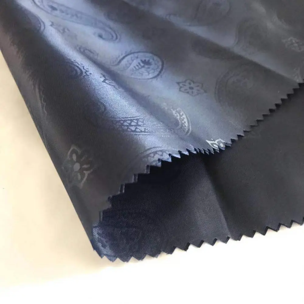 190T 210T Embossed Polyester Taffeta Lining Fabric 53GSM Dobby Design For Garment