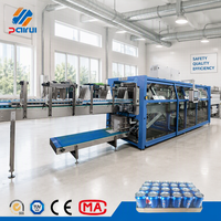 Machine d'emballage sous film rétractable automatique à grande vitesse pour l'emballage de groupes de canettes et de bouteilles