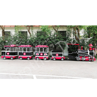 Manèges d'attractions parc amusant centre commercial train sans rail en fibre de verre pour enfants train à batterie pour la rue