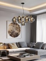 Luminaire suspendu en verre rond multi-têtes de style nordique moderne, minimaliste post-moderne, luxe léger, en fer forgé
