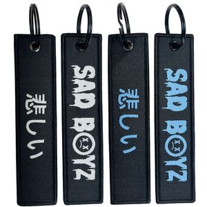 Wholesale Custom Fabric Embroidery WWOWN Patch <b>Key</b> <b>Ring</b> Tag Embroidered Carabiner & Promotional Keychain - Product Image 1