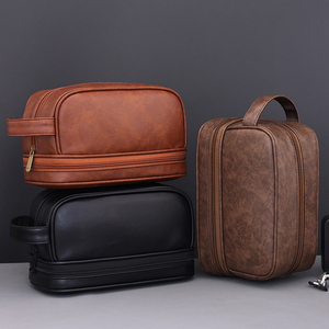 Trousse de toilette professionnelle pour <span class=keywords><strong>homme</strong></span> à double couche, essentiels pour les voyages d'affaires, <span class=keywords><strong>cuir</strong></span> PU de haute qualité, résistant à l'eau, organiseur de produits de toilette - Product Image 1