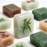 Ensemble de Mahjong haut de gamme en jade, avec tuiles de jade gris fumé, jade vert, jade blanc givré, ambre doré, lavande, rose pâle, bleu et noir - FACTORY