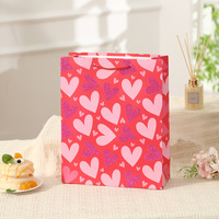 Sac cadeau en papier blanc universel au design adorable pour la Saint-Valentin, idéal pour l'emballage de cadeaux et le shopping.