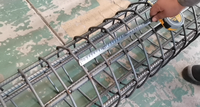 Machine de soudage de cages à poteaux de 12 m de long avec robot de soudage automatique
