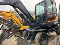 Mini-excavatrice Hyundai d'occasion sur roues, 6 tonnes, diesel, modèle 2023, godet de 0,32 m, avec rapport inclus