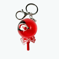Porte-clés liquide en forme de sucette de la série Noël Rouge pour la décoration des fêtes avec figurines flottantes du Père Noël, idéal pour sacs à dos et sacs à main
