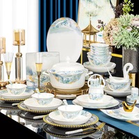Service de table en porcelaine artistique bleu et or, motif paysage montagne et eau peint à la main, bordure dorée, vaisselle de luxe en porcelaine fine