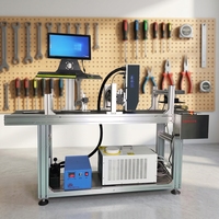 Machine de marquage laser UV pour sacs en plastique et boîtes en papier - Codage automatique de la date et impression d'enveloppes, vitesse 5-50 m/min, 3000 DPI