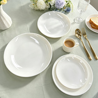 Assiettes en porcelaine blanche solide en forme de lune, assiettes rondes en céramique pour dîner, vaisselle pour hôtels et restaurants, vente en gros