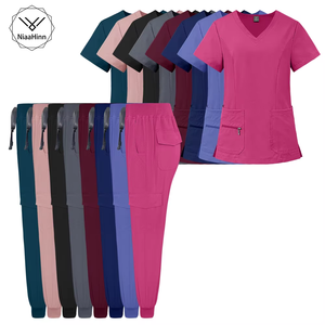 Uniforme da <span class=keywords><strong>Infermiera</strong></span> di Alta Qualità per Donne <span class=keywords><strong>in</strong></span> Blu Caraibico, Design alla Moda per Uniformi Mediche, Direttamente dalla Fabbrica - Product Image 1