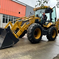 Chargeuse-pelleteuse JCB 4CX d'occasion, machine de terrassement, excavatrice, chargeuse-excavatrice, rétro-excavatrice JCB 4CX à vendre