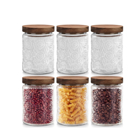 Bocaux en verre vintage avec couvercles en bois pour la cuisine : sucre, café, bonbons, épices, biscuits, thé, flocons d'avoine, pâtes
