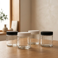 Pot en verre transparent à parois droites et large ouverture avec couvercle à vis en plastique noir/blanc sans BPA pour le stockage de crèmes de soin de la peau (vente en gros)