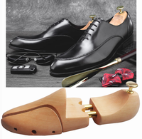Arbre à chaussures en bois de Lotus Shaper de chaussures en bois massif réglable Design gravé écologique Cuir anti-rides sans déformation