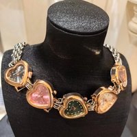 Montre chronographe haut de gamme pour femme, élégante et raffinée, avec bracelet en acier inoxydable, boîtier en alliage, bouton tendance, romantique et individualiste