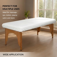 Ensemble de draps jetables confortables en quatre pièces avec housses de couette et taies d'oreiller, respirant pour les hôtels, les familles et les hôpitaux