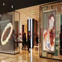 Panneau mural vidéo en verre à rideau de glace P2.6 P3.91, fenêtre transparente, publicité en magasin, écran LED en maille transparente, écran LED transparent