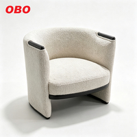 Fauteuil de salon moderne en tissu bouclé Teddy, idéal pour hôtel, maison ou salon.