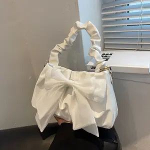 Tas wanita Retro desainer mewah tas tangan busur tas selempang mode kanvas wanita tren 2024 tas bahu dompet
