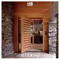 Porte d'entrée pivotante en bois massif insérée en verre au design moderne Serrure de surface peinte en peau de porte d'appartement de maison étanche