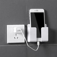 Nouveau support de téléphone mural auto-adhésif organisateur mural boîte de rangement en plastique charge téléphone support supports support pour chambre