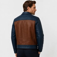 Maßgefertigte Herren Zweifarbige Kalbsleder-Jacke Braun-Marineblau Kontrast-Bomberjacke Echtes Leder Oberbekleidung Schrägtaschen OEM-Fertigung