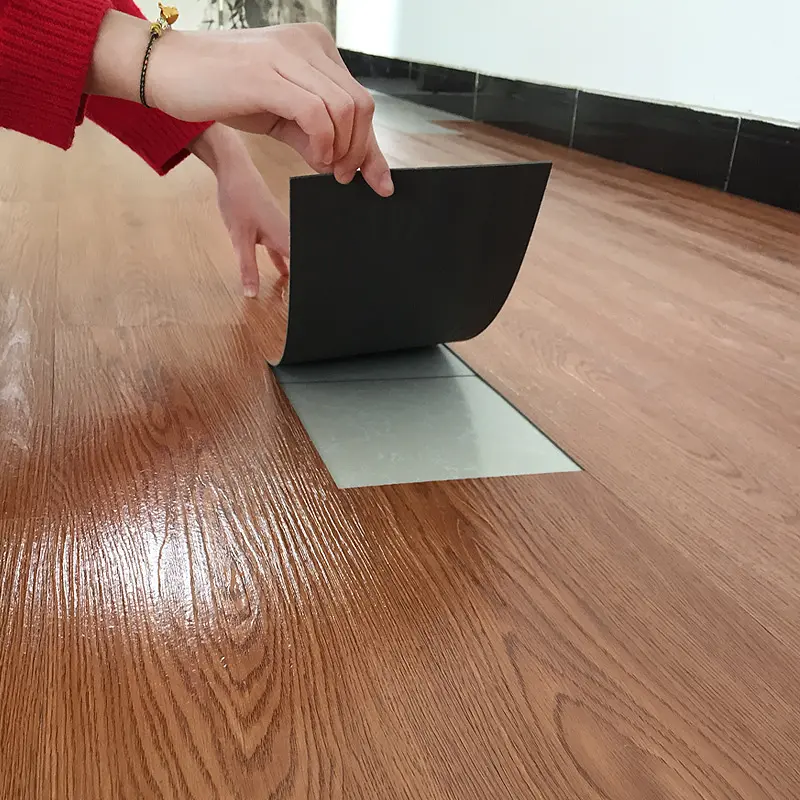 Cheap Wholesale Vinyl Plastic Flooring peel and stick floor tile adhesive pvc Plastic wood Flooring