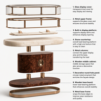 Îlot de présentation de bijoux ovale de luxe sur mesure, vitrine à montres en bois de burl avec comptoir en marbre et éclairage LED pour boutique de détail haut de gamme