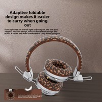 AKZ-606 Nouveau modèle exclusif transfrontalier d'écouteurs sans fil circum-auriculaires Bluetooth 5.4, pliables, avec fente pour carte et serre-tête à motifs