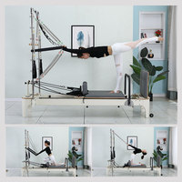 Ticari Meşe Ahşap Yarı Yükseltilmiş Yarım Trapez Pilates Kulesi, Beyaz Kaplamalı Kayar Yataklı, Pilates Stüdyosu Antrenmanı İçin