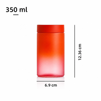 Pot en verre noir à dégradé de couleurs personnalisé, logo OEM, couvercle résistant aux enfants, bouchon en plastique écologique anti-odeur pour les bonbons au chocolat
