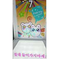 Machine de jeu d'arcade à monnayeur pour centre commercial, modèle Lucky 7, avec ciseaux de coupe pour la distribution de gros prix en forme de poupées