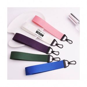 Bracelets personnalisés pour clés, portefeuilles et sacs – Porte-clés élégant couleur macaron et support de lanière en tissu - Product Image 1