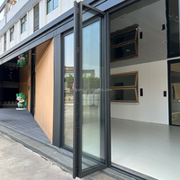 Portes pliantes à panneaux de verre en alliage d'aluminium au design moderne avec charnières de quincaillerie Stores de portes pliantes Raccords pour villas