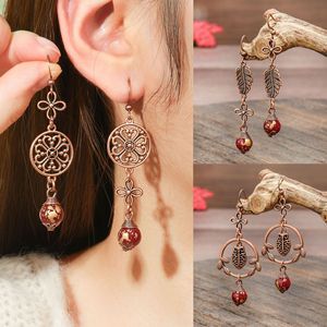 Boucles d'oreilles pendantes vintage en alliage de cuivre, plaqué bronze antique, motif floral, pour femmes - Product Image 1