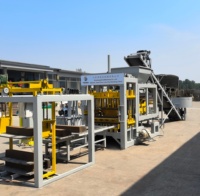 Machine à fabriquer des briques en béton QT4-15, ligne de production de briques entièrement automatique, machine à briques à haut rendement pour le Nigéria, le Kenya