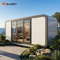 Maison conteneur modulaire de luxe personnalisable en matériaux haute résistance, bungalow clé en main avec salle de bain et cuisine