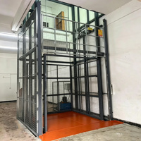 Monte-charge vertical hydraulique à rail de guidage pour charges lourdes, idéal pour l'entrepôt logistique et une utilisation stable