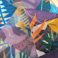 Vente en gros 100% polyester tissu jacquard en mousseline de soie motif imprimé pour robes de femmes rideaux mariages et vêtements