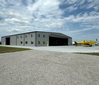 Hangar agricole métallique pour traitement du café et cacao — Structure galvanisée, ventilation tropicale optimisée, protection