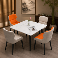 Table à manger minimaliste stable en pierre frittée carrée et 4 chaises rembourrées avec pieds en métal, ensemble de meubles de salle à manger pour la maison